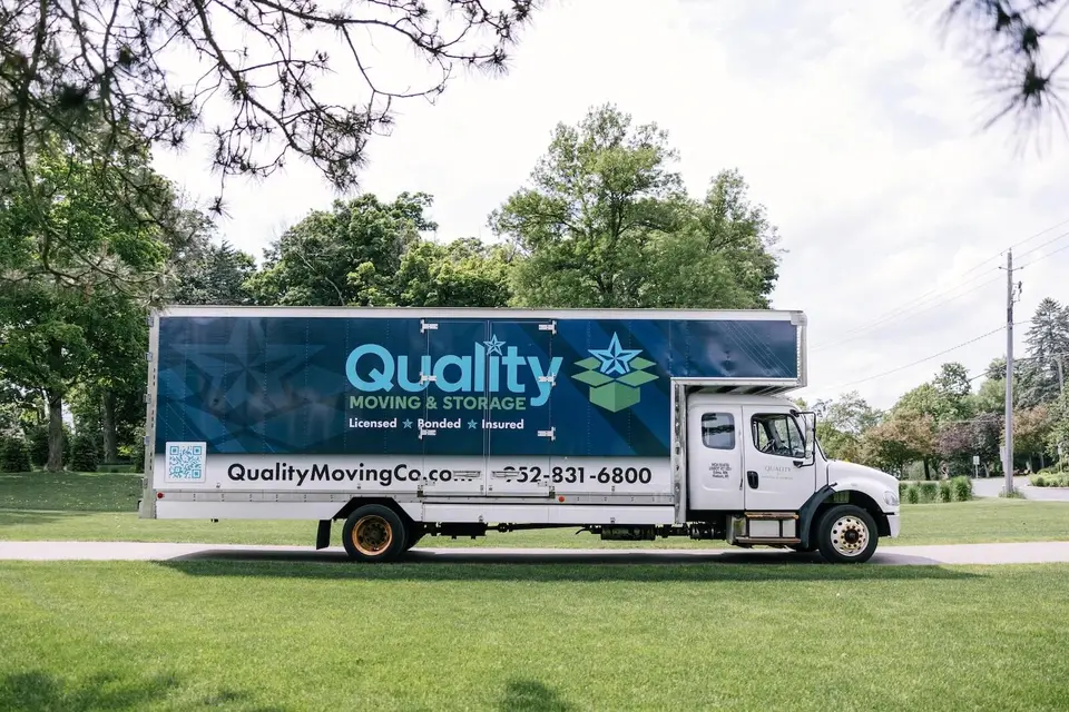 Quality Moving & Storage branded box truck